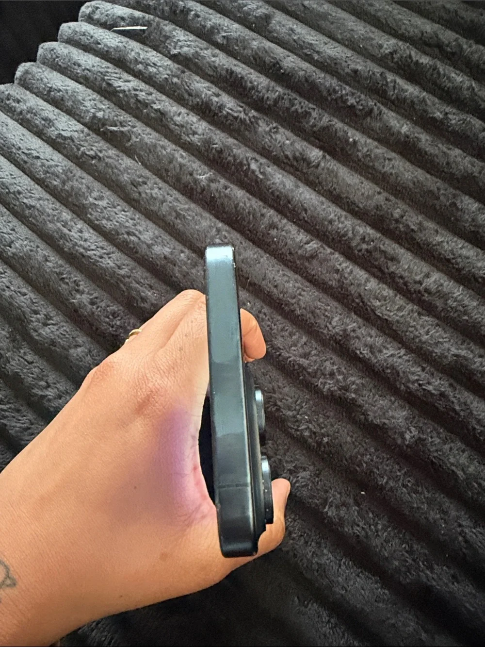 Apple iPhone in Black with Blue-Green Display Accent